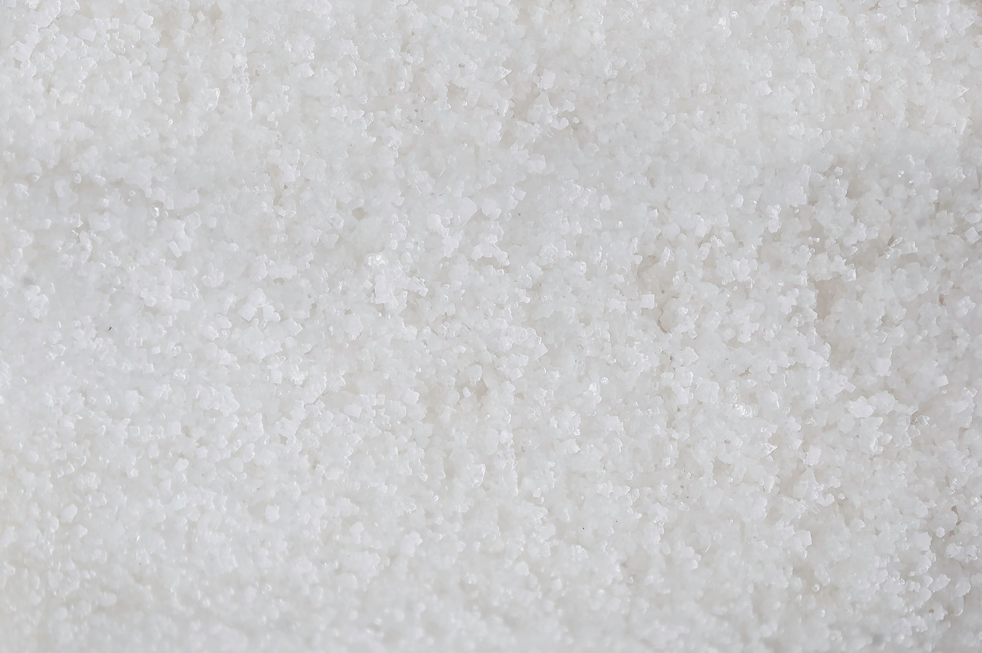 Close-up of coarse white sea salt crystals