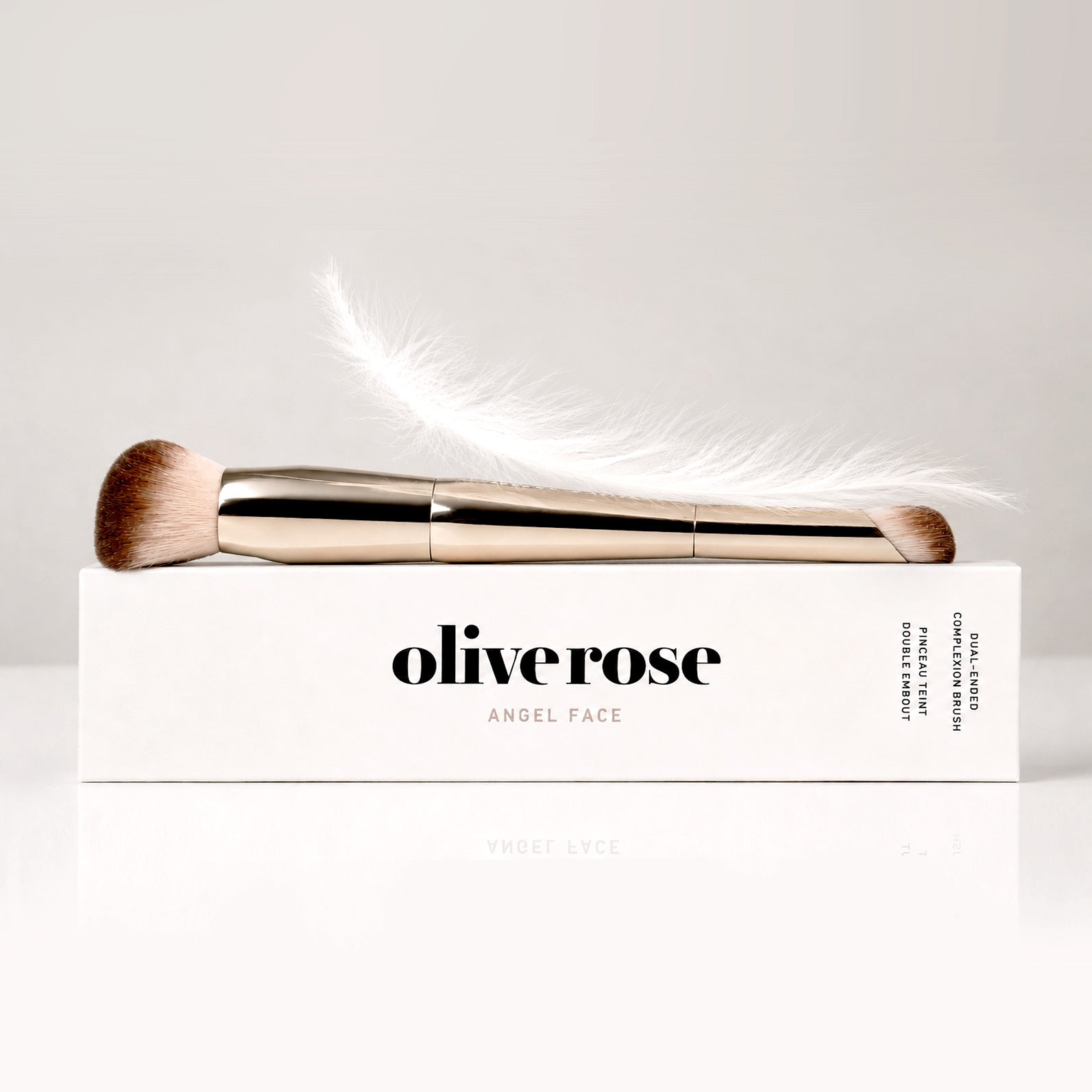 Olive Rose Brush on top of a box