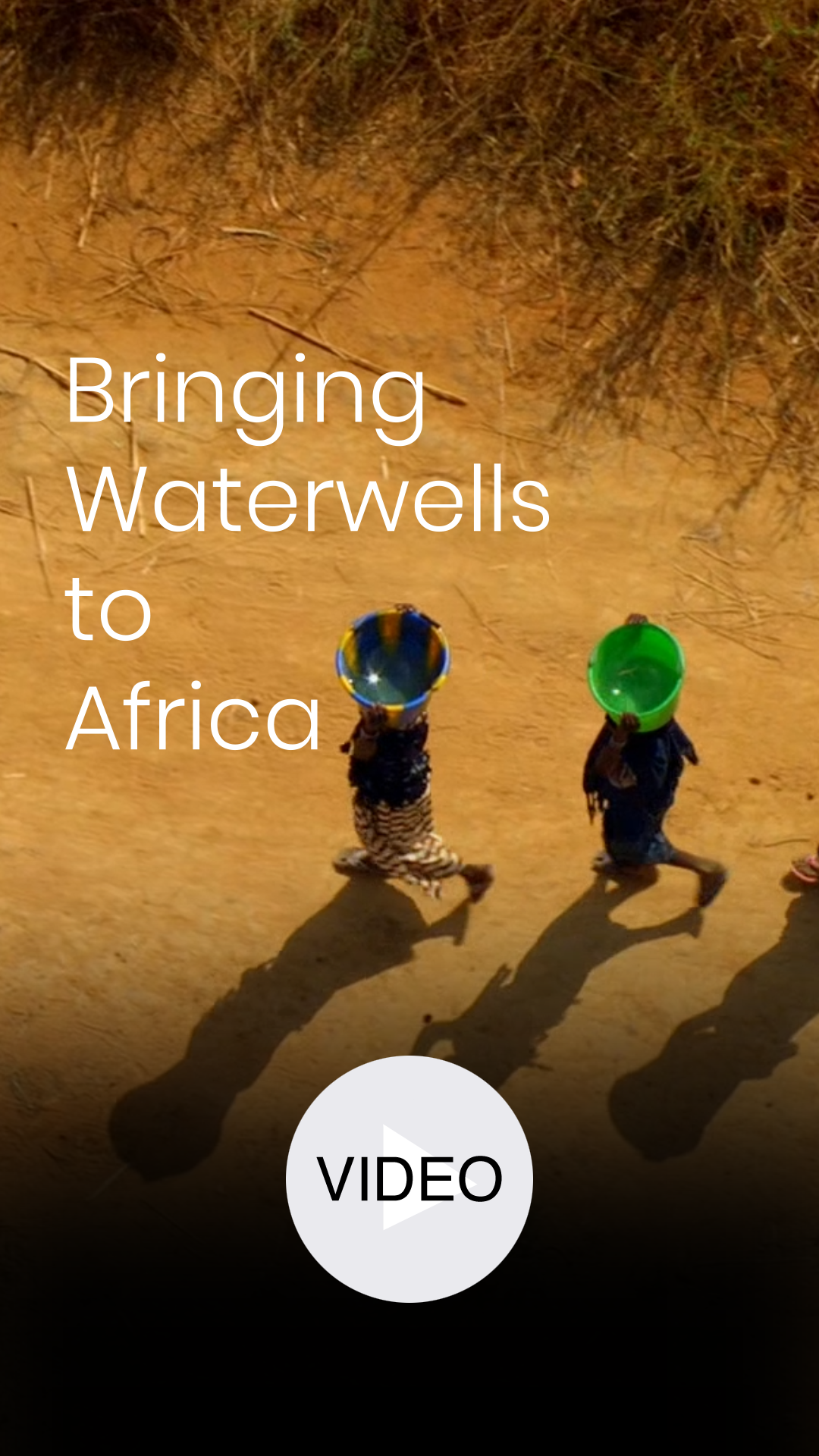 Aerial view of two people carrying colorful basins on their heads along a dirt path, overlaid text 'Bringing Waterwells to Africa'