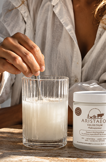 Aristaeos product ad, model mixing the drink