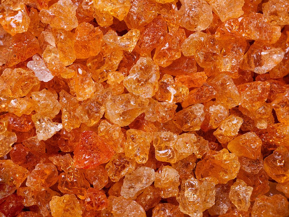 Close-up of amber-brown rock sugar crystals