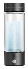 Personal ultrasonic humidifier with black base and cap, clear glass chamber showing bubbling blue water