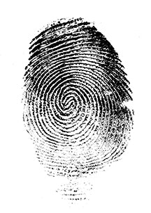 Single black ink fingerprint showing a distinct whorl (spiral) pattern on a white background.